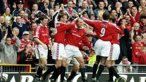 Jordi Cruyff is congratulated by his Manchester United team mates after his 73rd minute equaliser during the FA Carling Premier League game between Manchester United and Wimbledon at Old Trafford in 1999