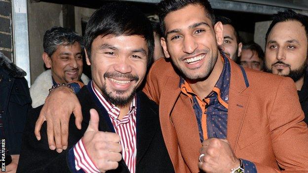 Manny Pacquiao (left) with Amir Khan last month