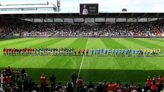 Players and spectators observe a minute's silence at London Irish v Worcester Warriors