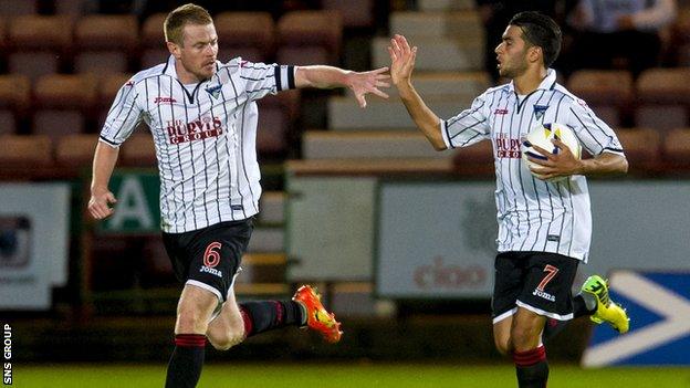 Dunfermline captain Andy Geegan (left) celebrates with team-mate Faissal El Bakhtaoui.