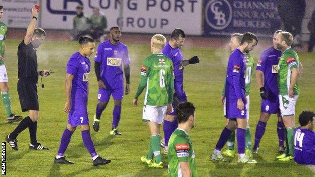 Marc McGrath (second Guernsey player from right) is sent off late-on for Guernsey FC