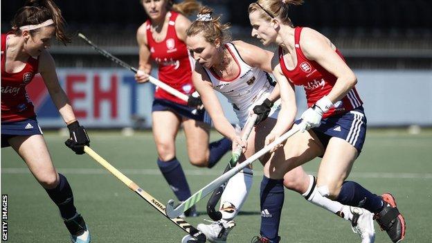 Nike Lorenz of Germany, Elena Rayer of England fight fo the ball during the European Hockey Championship match