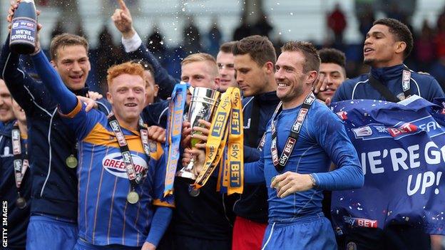 The 2014-15 League Two runners-up Shrewsbury Town celebrate promotion