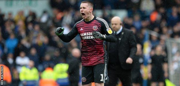 Sheffield United goalkeeper Dean Henderson celebrates their victory at Leeds