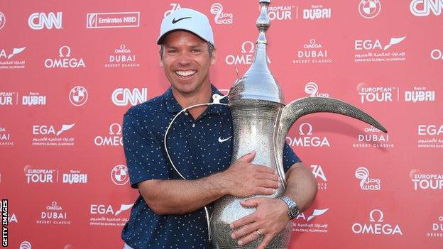 Paul Casey with the winner's trophy