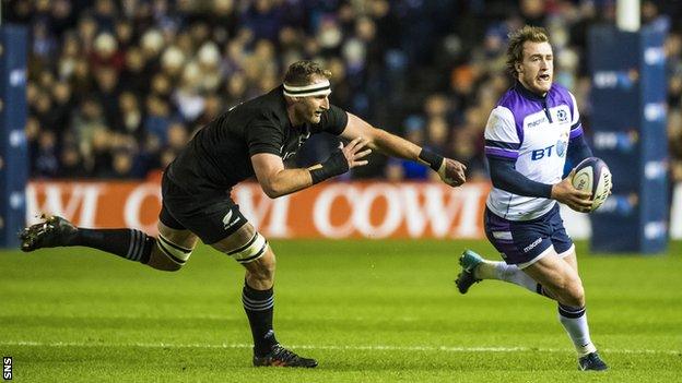 New Zealand captain Kieran Read chases Scotland's Stuart Hogg