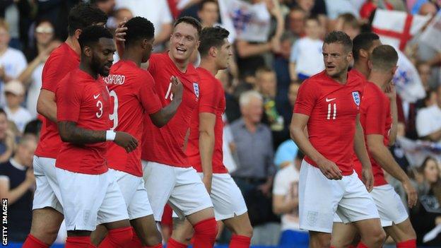 England players celebrate their opening goal against Costa Rica