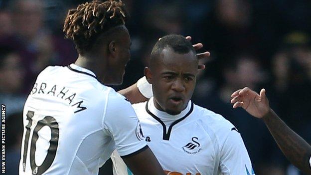 Jordan Ayew (R) is Swansea's top scorer this season with 11 goals, while Tammy Abraham has eight