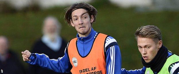 Odense midfielder Rasmus Falk (left) in training