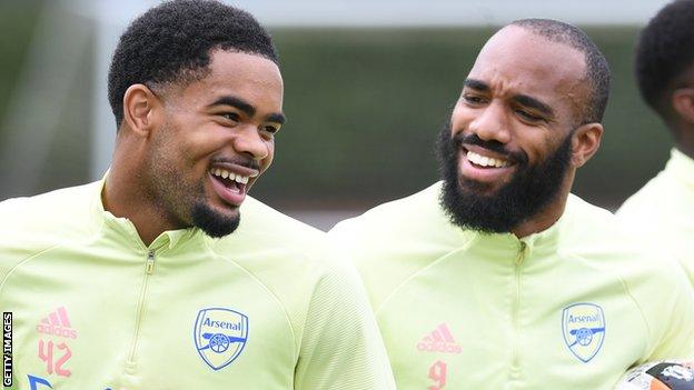 Trae Coyle (left) and Alex Lacazette