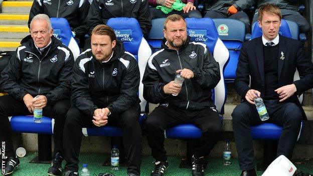 (L-R) Alan Curtis, assistant coach, Bjorn Hamberg, assistant coach, Billy Reid, assistant manager and manager Graham Potter