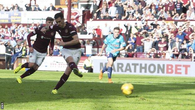 Jamie Walker scores a penalty