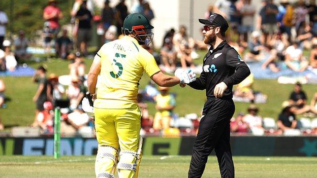 Australia's Aaron Finch (left) and New Zealand's Kane Williamson (right) shake hands before Finch's last one-day international innings