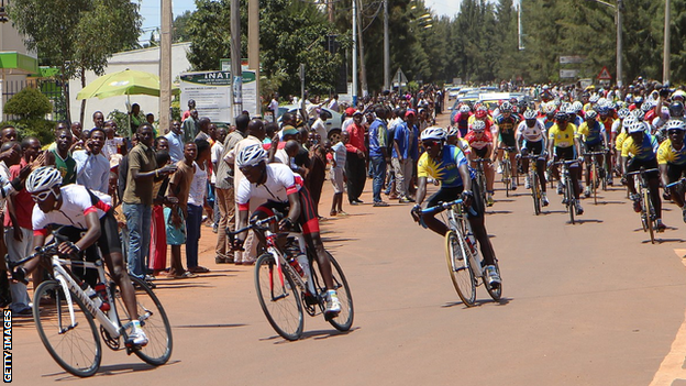 Cyclist ride through Kigali during the Tour of Rwanda