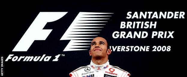 McLaren Mercedes" Lewis Hamilton celebrates winning the British Grand Prix at Silverstone in 2008