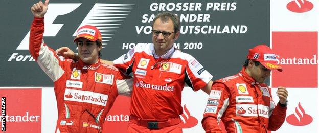 Fernando Alonso celebrates winning the 2010 German Grand Prix with Ferrari