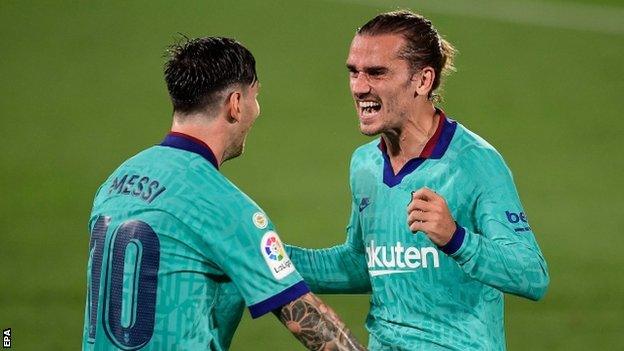 Lionel Messi and Antoine Griezmann