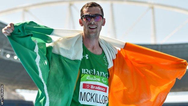 Michael McKillop celebrates clinching the fourth Paralympics gold of his career