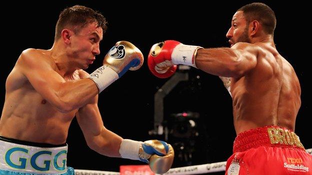 Gennady Golovkin beat Kell Brook with a fifth-round stoppage to retain his WBC and IBF middleweight titles.