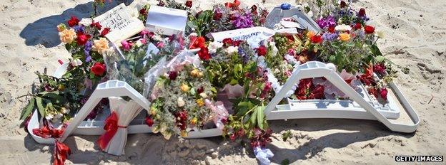 A floral tribute on the beach at Sousse, where 38 people were killed on Friday