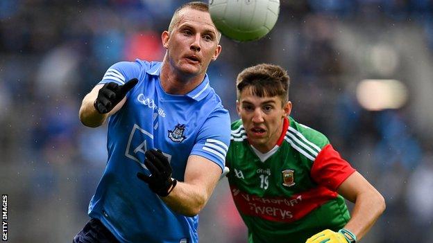 Mayo's Enda Hession is about to get in a challenge on Dublin's Ciaran Kilkenny in the All-Ireland semi-final