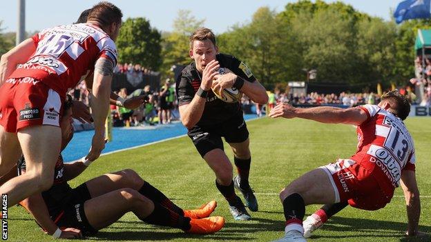 Saracens winger Liam Williams dives over the line to score his side's second try against Gloucester