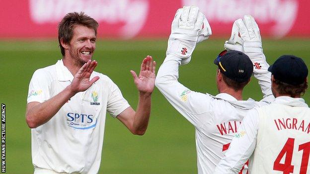 Michael Hogan celebrates after Ryan Davies of Kent is caught by Aneurin Donald of Glamorgan