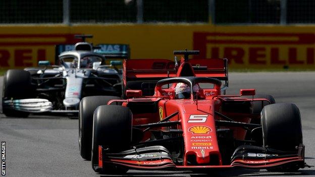 Sebastian Vettel leads Lewis Hamilton during the Canadian Grand Prix