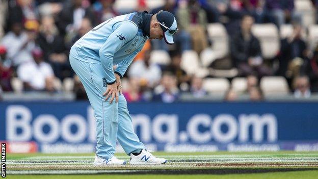 England batsman Jason Roy tries to stretch his hamstring after pulling up against West Indies