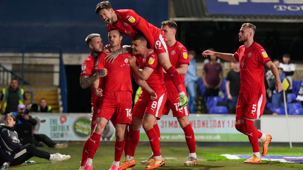 Wigan celebrate taking the lead against Ipswich