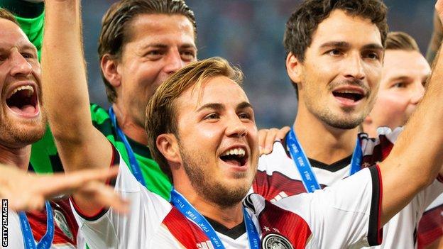 Germany players celebrate World Cup victory in 2014.