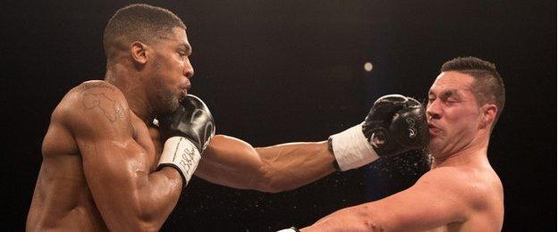 Anthony Joshua v Joseph Parker, Joshua punching Parker square in the face