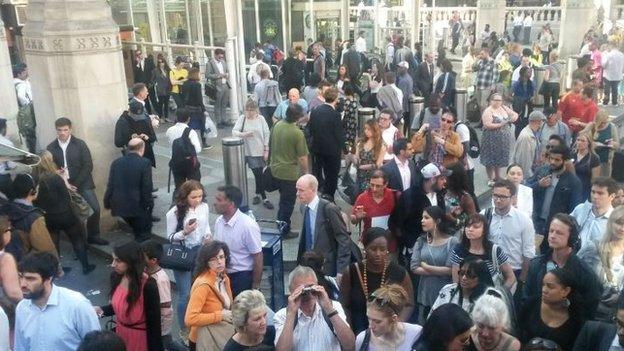 Commuters at Liverpool Street Station on 9 July