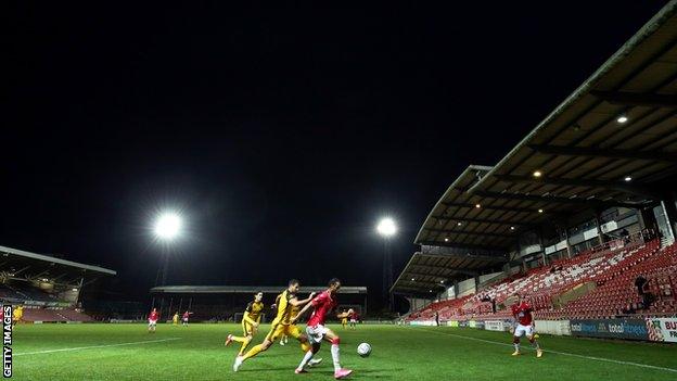 Wrexham in action against Aldershot at the Racecourse