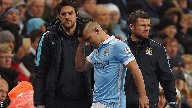 Sergio Aguero walks off