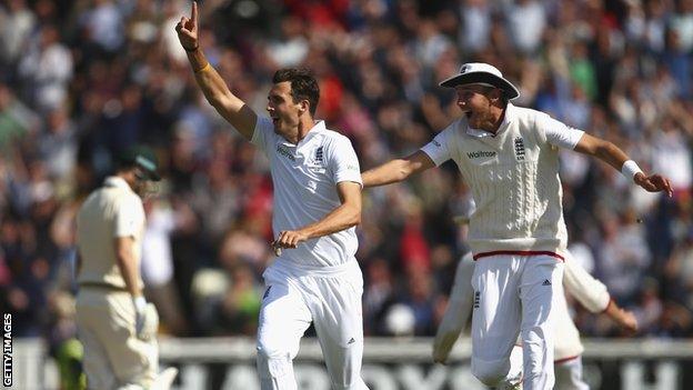 Steven Finn celebrates a wicket with Stuart Broad