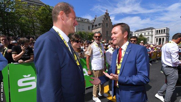 Tour de France director Christian Prudhomme (left) spoke to UCI president David Lappartient (right) before stage one of the 2019 race