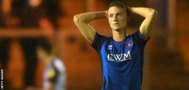 Carlisle's Jack Armer reacts to his side's 3-3 draw at home against Bolton