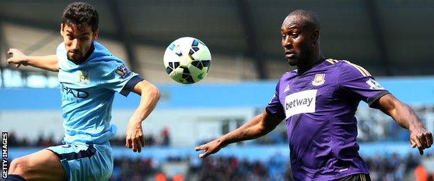 Jesus Navas and Carlton Cole