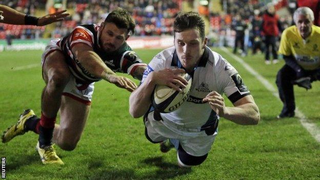 Mark Bennett dives over to score Glasgow's third try