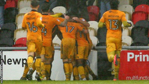 Players celebrate Tom Owen-Evans’ goal