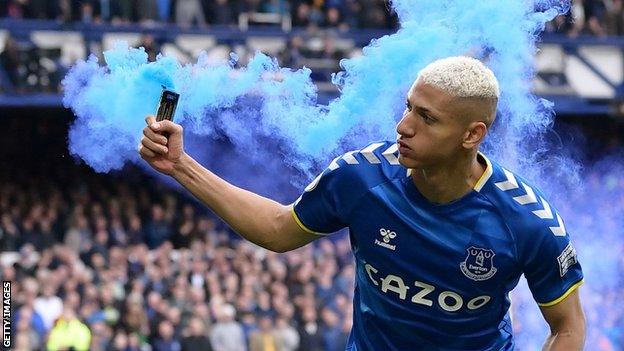 Everton's Richarlison throws smoke bomb during Chelsea match