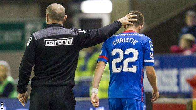 Inverness manager John Hughes congratulates Ryan Christie on his performance during the side's 2-0 win over Hearts in the Scottish Premiership