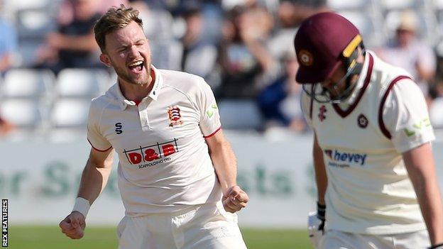 Essex bowler Sam Cook celebrates the wicket of a Northamptonshire batsman