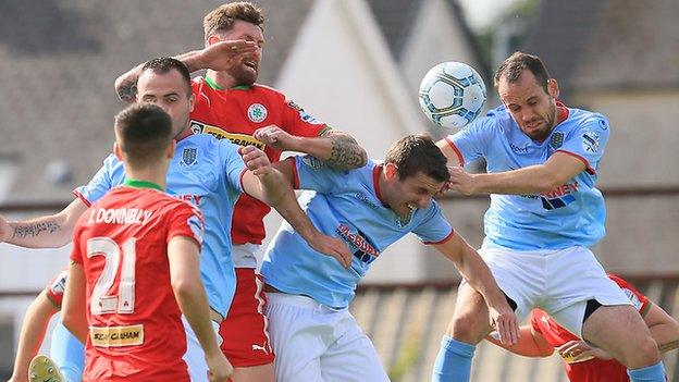 Ballymena's Tony Kane looks favourite to get his head on the ball in the win over Cliftonville