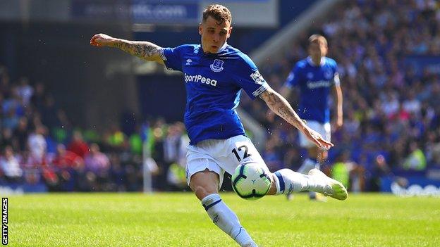 Lucas Digne of Everton strikes the ball and scores in a match against Manchester United at Goodison Park