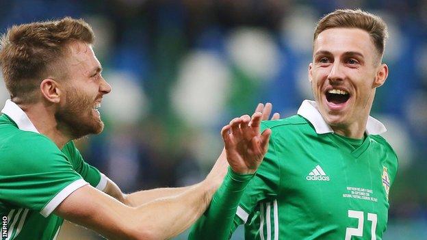 Gavin Whyte celebrates scoring on his NI debut against Israel in 2018