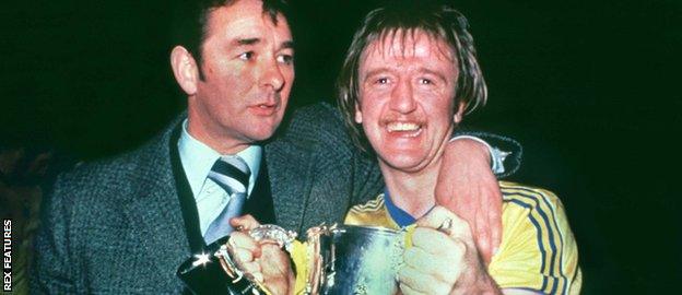 Kenny Burns holds the League Cup with Brian Clough