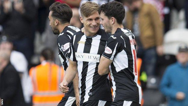 Gavin Reilly (centre) celebrates scoring a goal for St Mirren