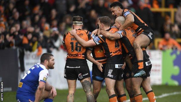 Castleford celebrate a try against St Helens